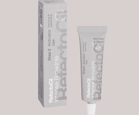 "RefectoCil Activator Gel for Intense Browns, essential for activating tint during lash and brow treatments. Grey tube in a green box with white lettering"