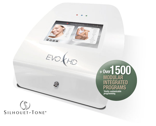 The Silhouet-Tone Evolution 7 HD electrolysis device features a sleek white square body with rounded edges and silver accents. It includes a digital touch screen, offering precision hair removal with three frequencies: 6.78 MHz, 13.56 MHz, and 27.12 MHz. Ideal for various hair types, this device provides advanced treatment options for professionals.