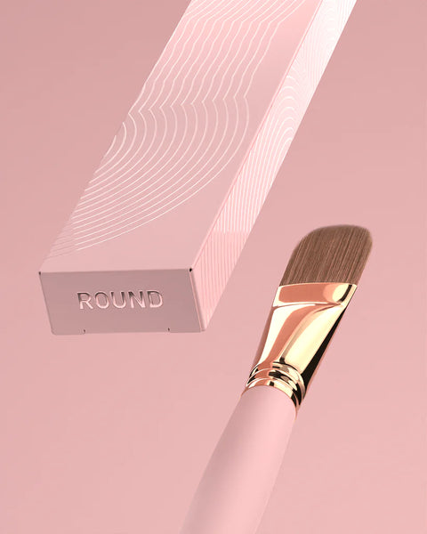 "Brow Daddy Framework Master Brush, available in 2 options, for precise application in brow makeup and microblading, displayed on a clean, pink background , brush aside a box"